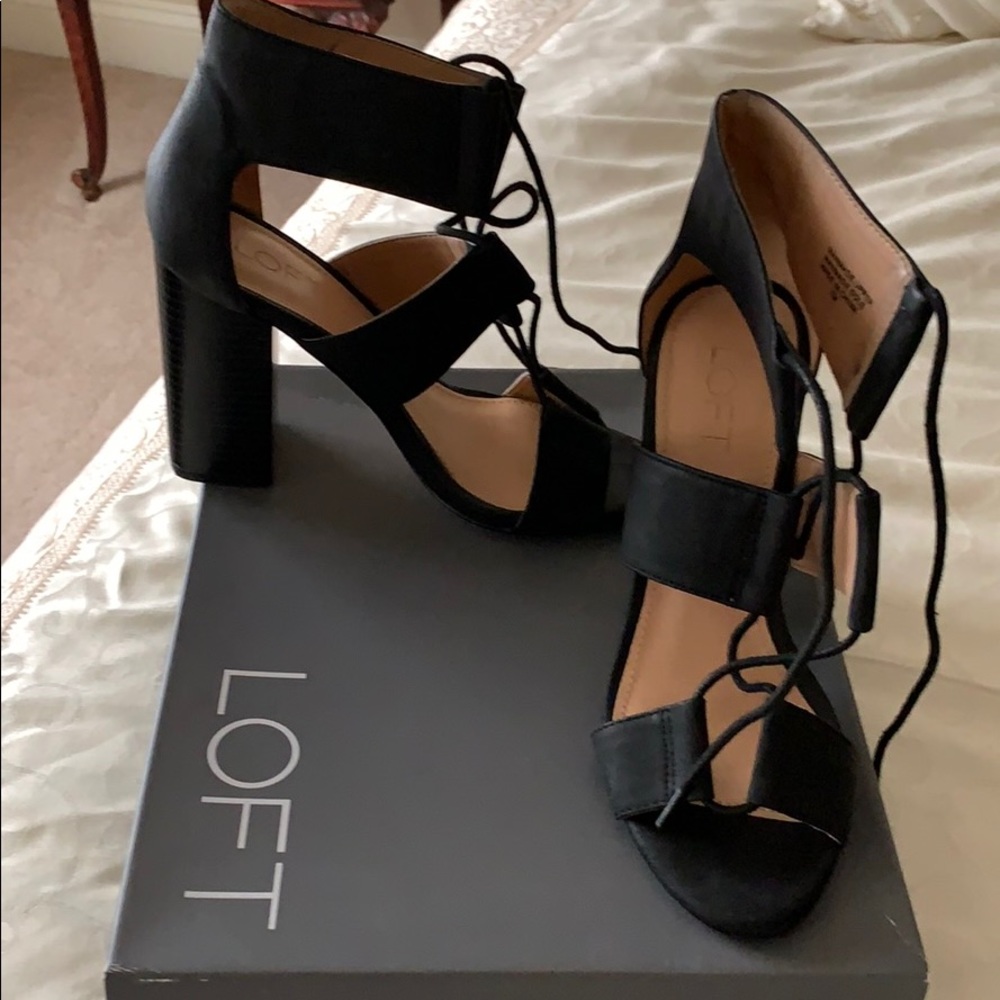Black lace up block heel size 7.